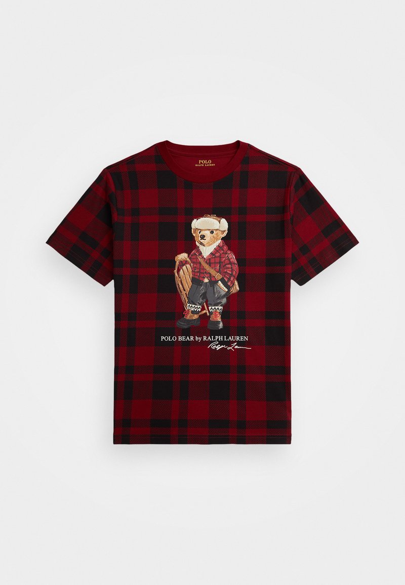 Röd och svart rutig bomull t-shirt med en björngrafik i en röd flanellklädsel, med tryckt text under illustrationen.
