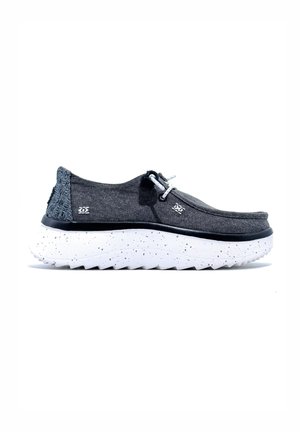 Gray slip-on shoes with a textured back, featuring a white speckled sole and elastic laces for easy wear. Soft fabric upper.