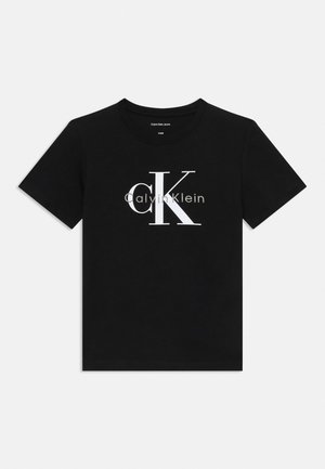 Crna majica kratkih rukava s bijelim logotipom "cK Calvin Klein" u sredini sprijeda.