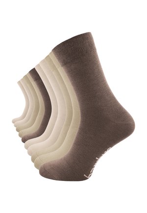 Ensemble de huit paires de chaussettes dans diverses nuances de beige et de marron, avec une texture lisse et des poignets côtelés. Chaque paire a un design sans coutures.