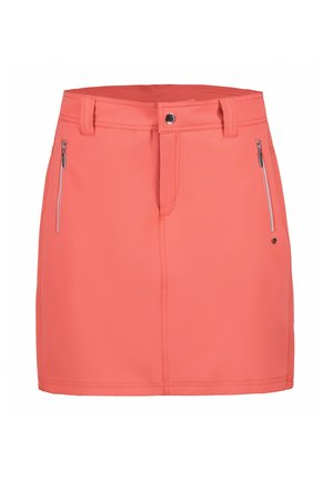 Koraalkleurige rok met een slanke pasvorm, voorzien van een ritssluiting en twee ritszakken. Gemaakt van een soepele, lichte stof met zichtbare stiksels.