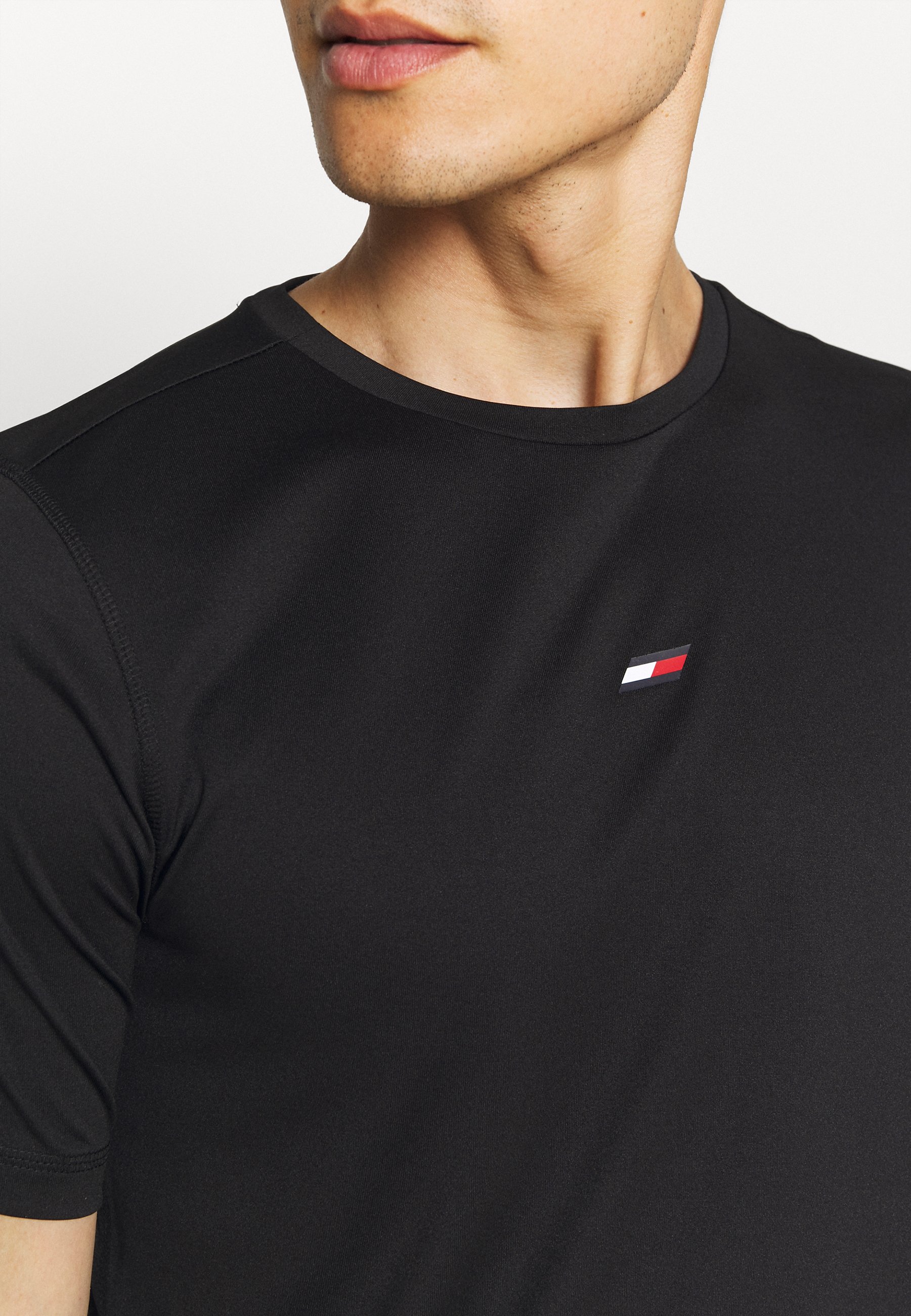 Uomo MOTION FLAG TRAINING TEE - T-shirt basic Uomo MOTION FLAG TRAINING TEE - T-shirt basic