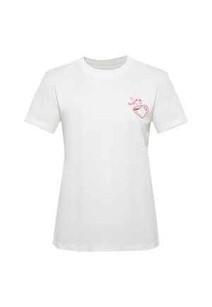 White short-sleeve t-shirt with a small red coffee cup illustration and the word "DAYDREAMING" above it on the left chest.