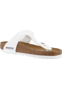 Sandali Birkenstock con tomaia sintetica bianca, suola in sughero e suola in gomma. Presentano un distanziale per le dita e una cinghia regolabile per una vestibilità ottimale.