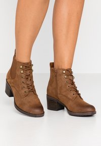 Anna Field Boots à talons - cognac