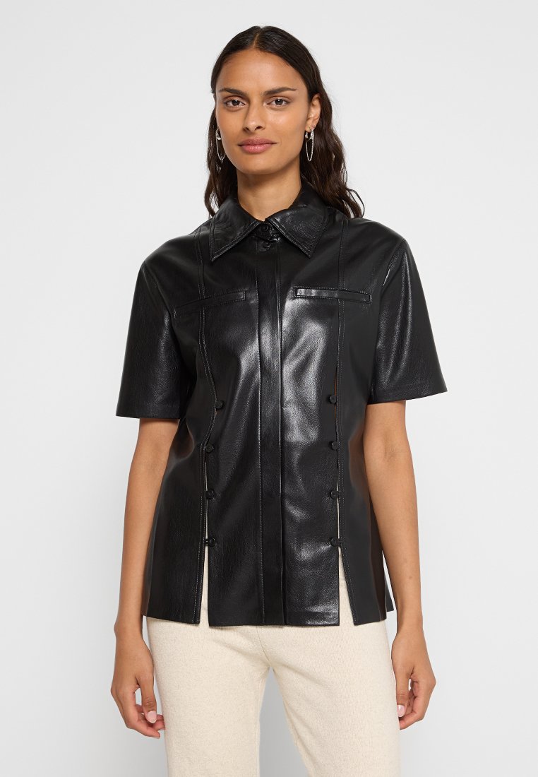 Nanushka Overhemdblouse zwart Nanushka Overhemdblouse zwart