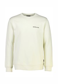 Sudadera de color crema hecha de tela suave, con un cuello redondo, mangas largas, puños acanalados y un pequeño logo negro en el pecho.