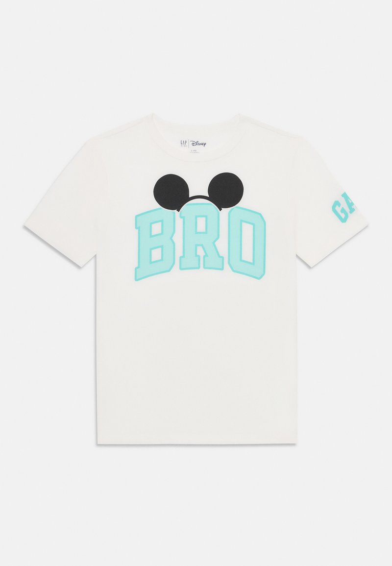 White cotton t-shirt featuring a turquoise "BRO" graphic with black Mickey Mouse ears above, and "GAP" printed in turquoise on the sleeve.