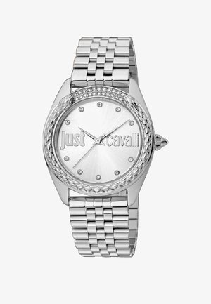 Montre en argent avec une lunette texturée, dotée d'un cadran poli et d'accents en cristal aux index horaires. Bracelet en maillons métalliques.