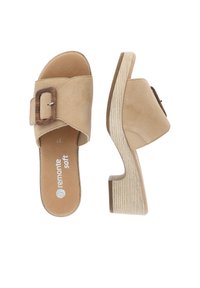 Beige suede platform sandals with a wide strap, a wooden buckle accent, and a textured light wood heel. Footbed features the brand name.
