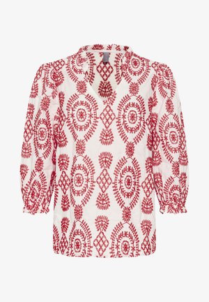 Blusa blanca con bordado floral rojo, escote en forma de V y mangas abullonadas con puños elásticos. El patrón incluye intrincados diseños geométricos.