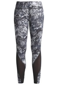 Legginsy z wysokim stanem w czarno-szarym abstrakcyjnym wzorze, z panelami siateczkowymi i dopasowanym krojem, idealne do aktywności. Logo Nike na pasku.
