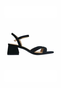 Zwarte suede sandaal met een blokhak. Beschikt over twee brede kruiss banden en een enkelband voor ondersteuning. Glad zooloppervlak.