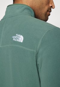 The North Face GLACIER 1/4 ZIP - Felpa in pile - duck green