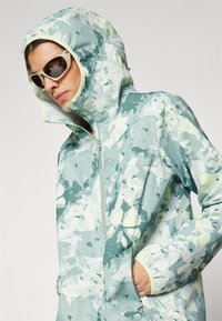 Helly Hansen GRAPHIC RAIN JACKET - Ūdensnecaurlaidīga jaka - eucalyptus