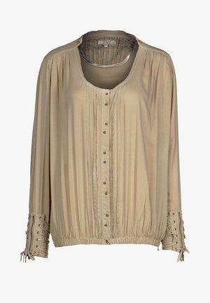 Blusa beige a maniche lunghe con davanti plissettato, collo rotondo, chiusura con bottoni e polsini elasticizzati con dettaglio intrecciato sulle maniche.