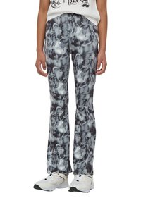 Pantaloni in poliestere elasticizzato con un motivo astratto in bianco e nero, design a gamba dritta, con una texture morbida e liscia e una vestibilità comoda.