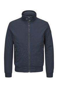 Marineblaue Bomberjacke aus leichtem Stoff mit einem Reißverschluss vorne, Stehkragen und zwei Seitentaschen. Strukturierte Bündchen und Saum.