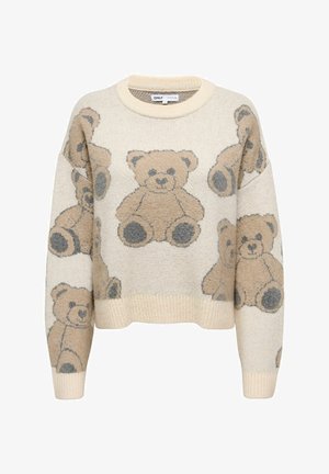 Suéter de crema con un diseño cropped que presenta patrones de osito de peluche en beige y gris. Textura de punto con puños y dobladillo acanalados.