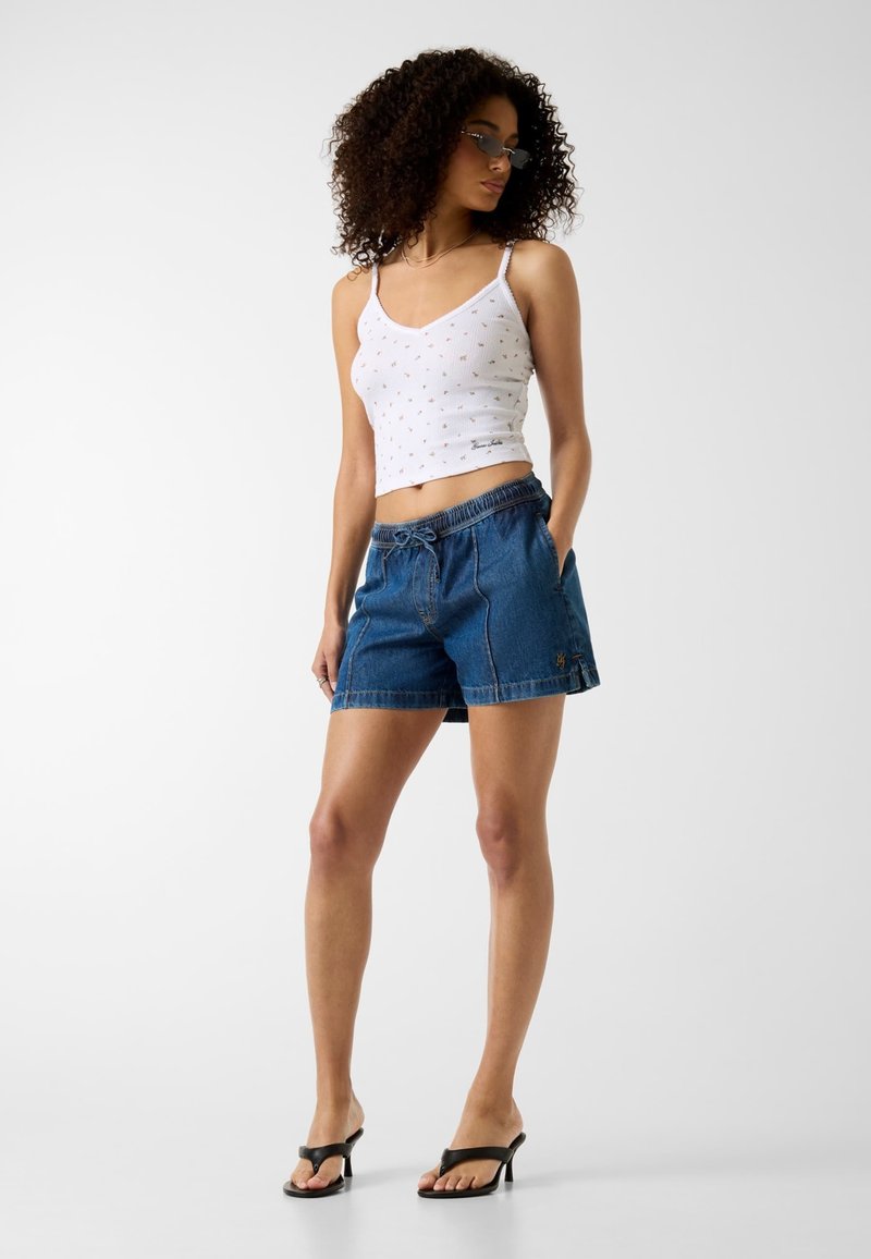 Bermuda En Jeans GUESS Taille 34-36 (équivalent W25) Pour Femme – Quasi Neuf, Coupe Cargo Décontractée