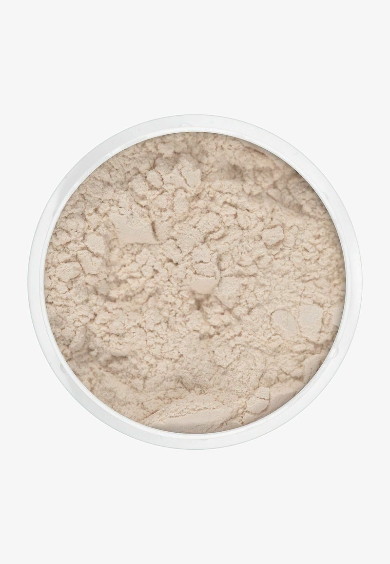 Lose Puder kosmetisch in einem runden weißen Behälter, mit einem hellbeigen Farbton, feiner, weicher Textur und leicht unebener Oberfläche.