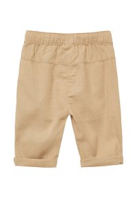 Lichtbeige, knielange shorts van zachte stof. Voorzien van een elastische tailleband en opgerolde zomen voor eenRelaxte pasvorm. Glad textuur.