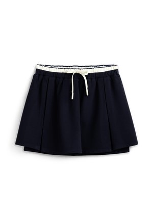 Marineblauer Faltenrock mit weißem elastischem Bund und vorderer Kordel zum Zusammenziehen, auf weißem Hintergrund dargestellt.