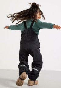 Lindex WITH ADJUSTABLE LEGS – PERFORMANCE WEAR - Overall /Buksedragter - black