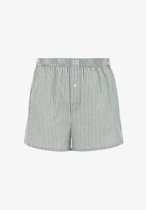 Boxers verts et blancs à rayures verticales, fabriqués en tissu léger. Dotés d'une taille élastique et d'un seul bouton à l'avant.