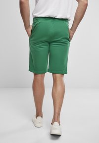 Urban Classics Tepláky - junglegreen
