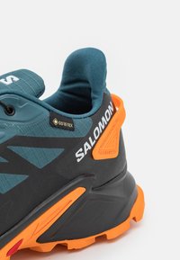 Salomon SUPERCROSS 4 GTX - Trail hardloopschoenen - stargazer/black/turmeric