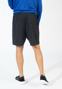 Spyder CAMOUFLAGE - Pantalón corto de deporte - black