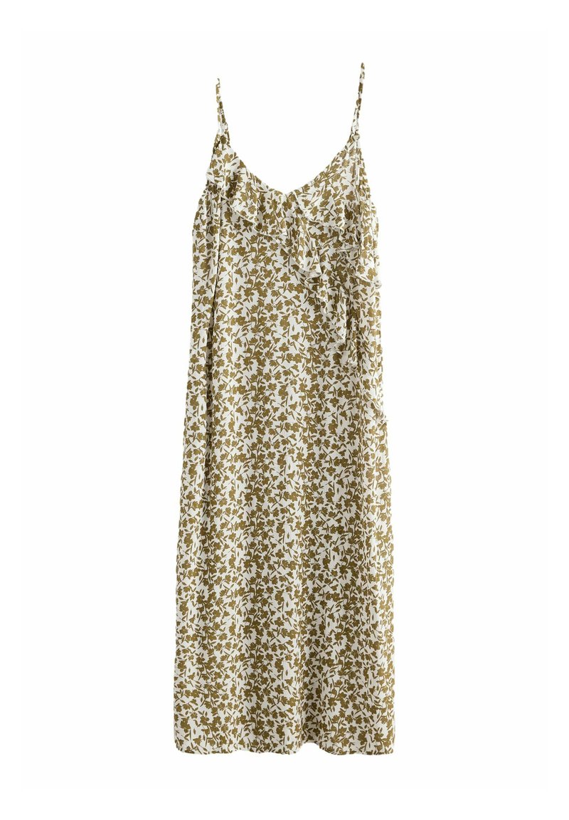 Robe fleurie à bretelles spaghetti, avec un fond blanc et un motif de feuilles brun verdâtre. Tissu léger et fluide avec des détails en volants.