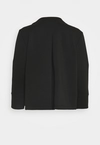 Zwarte gestructureerde blazer met een brede kraag, lange mouwen en een naad in het midden achter. Gemaakt van een zachte, gladde stof met een matte afwerking.