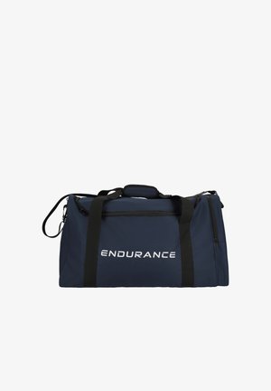 Sac de sport couleur bleu marine avec des sangles noires et le logo "ENDURANCE" sur le devant, doté de plusieurs compartiments zippés.