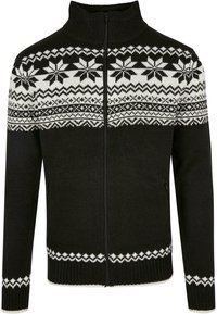 Sudadera negra con cremallera y cuello alto, presenta patrones en blanco de copos de nieve y geométricos en la sección superior, puños acanalados y bajo.
