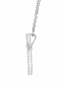 Hõbedast kaelakee, millel on sile ja piklik ripats, kaunistatud rea väikeste, läbipaistvate kristallidega. Keti lingid on ühtlase suurusega ja poleeritud.