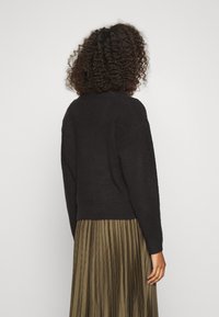 NA-KD Chaqueta de punto - black