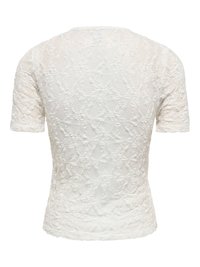 Haut en dentelle blanc à manches courtes avec motifs floraux et géométriques, vu de dos sur un fond blanc uni.