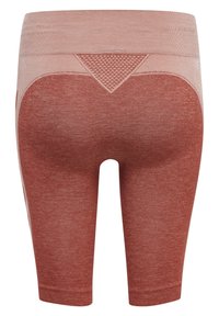 Sømløse rust- og beige biker-shorts med høj talje og struktureret trekantet detalje på bageste taljebånd.