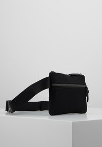 Zign Bältesväska - black