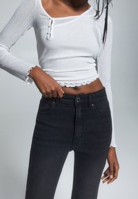 PULL&BEAR Flared Jeans - black