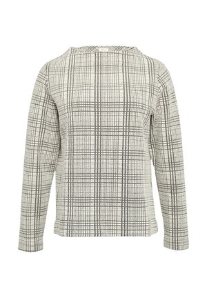 T-shirt à manches longues en tissu texturé, présentant un motif à carreaux noir et blanc, un col arrondi et une coupe décontractée.