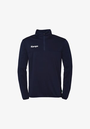 Navyblauwe lange mouwen pullover met halve rits kraag, gemaakt van zachte stof, met een witte "Kempa"-logo op de borst.