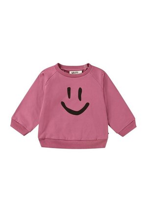 Sweat-shirt rose à manches longues pour tout-petit avec un motif de visage souriant noir sur le devant et des boutons-pression à l'épaule.