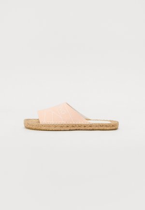 Light pink slide sandal with a textured fabric upper and a braided jute sole. Design features a subtle white pattern along the strap.