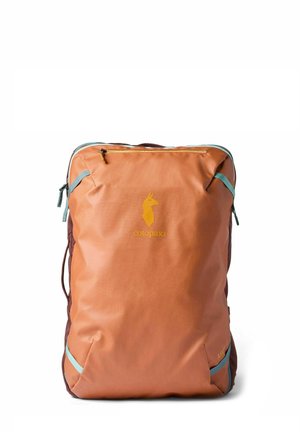Brown Cotopaxi backpack with yellow llama logo, teal zipper pulls, and minimalist design on a white background.