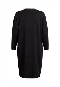 Schwarzes, langärmliges Kleid mit lockerem Schnitt aus weichem Stoff. Verfügt über einen abgerundeten Ausschnitt und reicht bis zur Mitte der Wade. Einfaches Design.