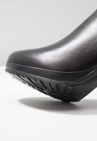 Tamaris Bottes à plateau - black