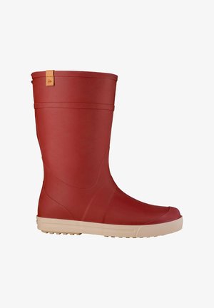 Red mid-calf rubber boot with beige textured sole and small tan pull tab near the top, shown from the outer side.